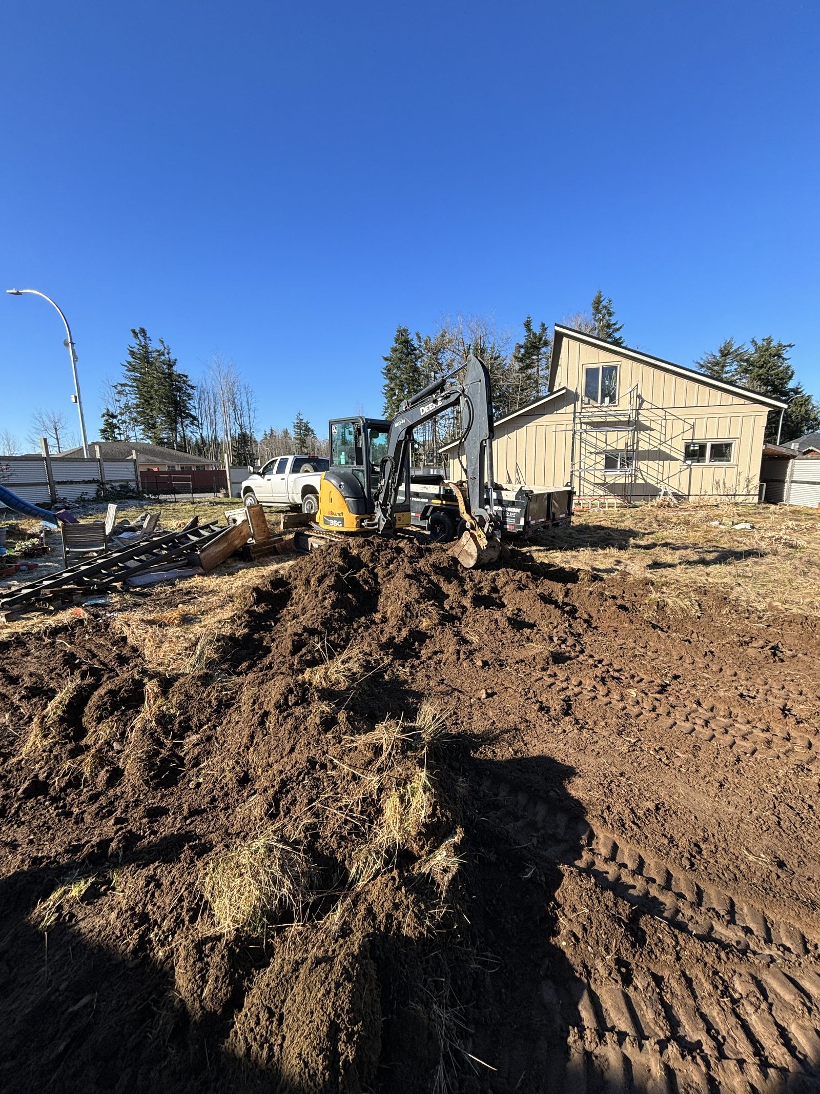 Backyard excavation and grading Vancouver Island