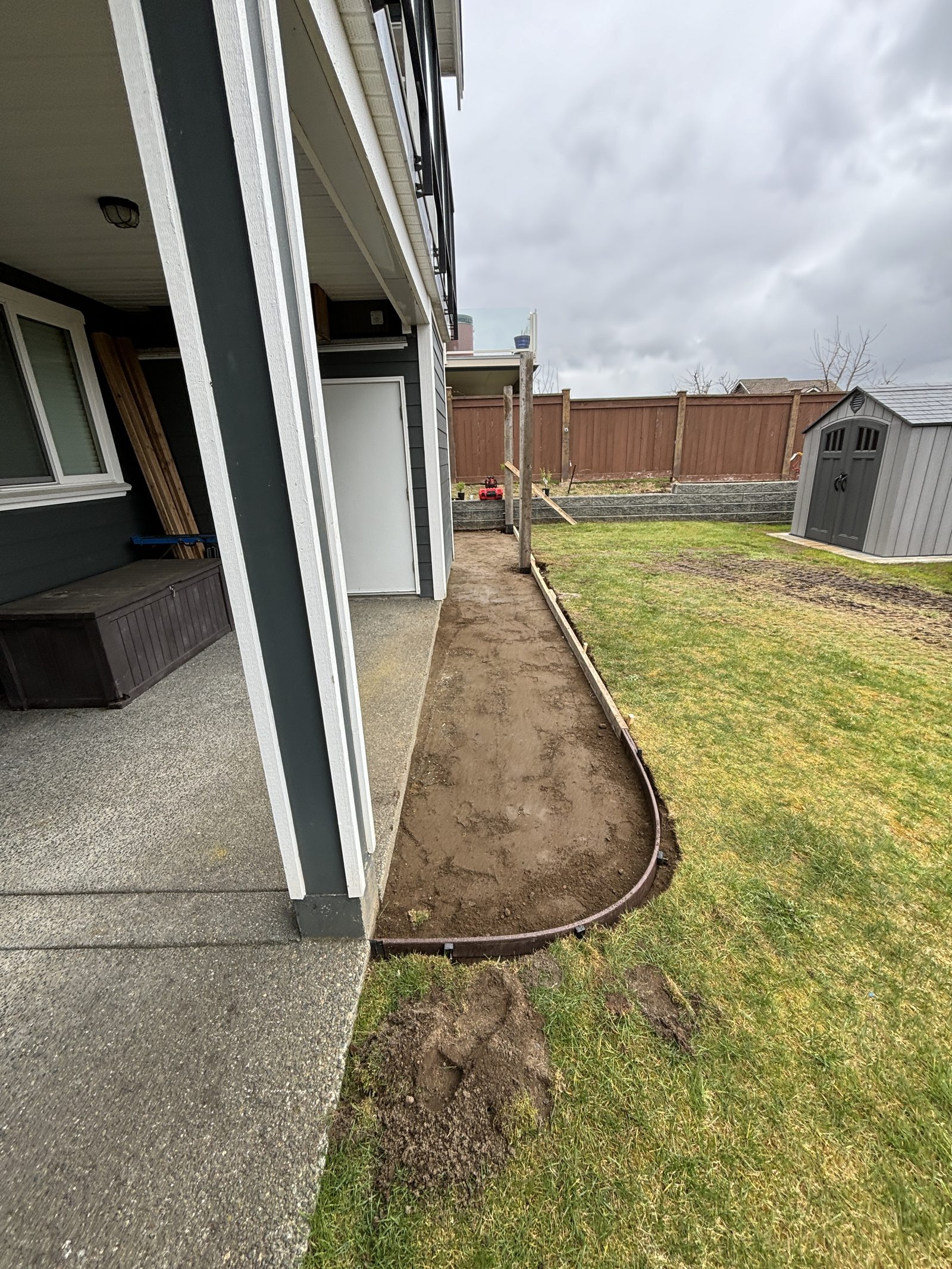 Concrete forming exposed aggregate driveway Vancouver Island