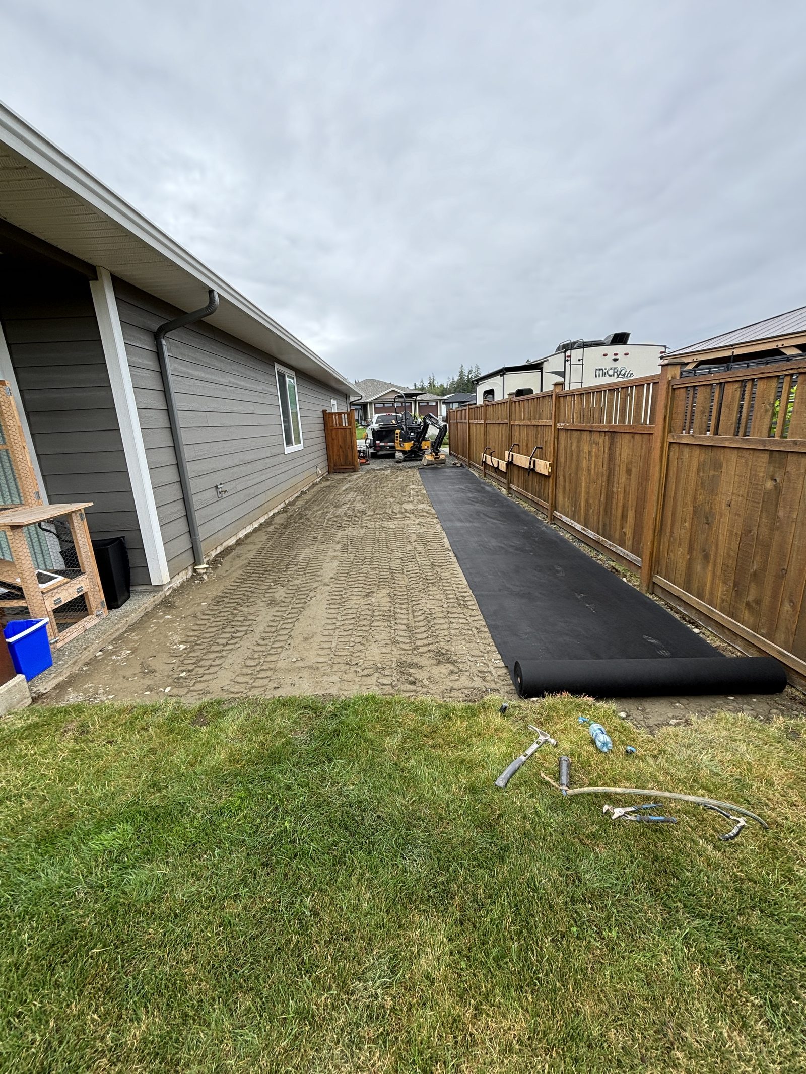 Gravel compaction driveway extension Vancouver Island