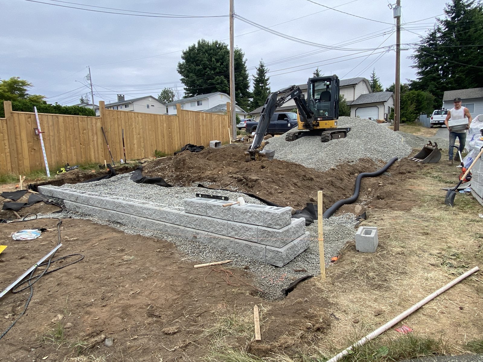 Retaining wall foundation for parking pad Vancouver Island
