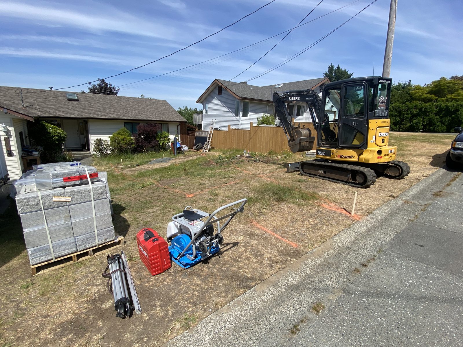 Finished parking pad retaining wall Vancouver Island