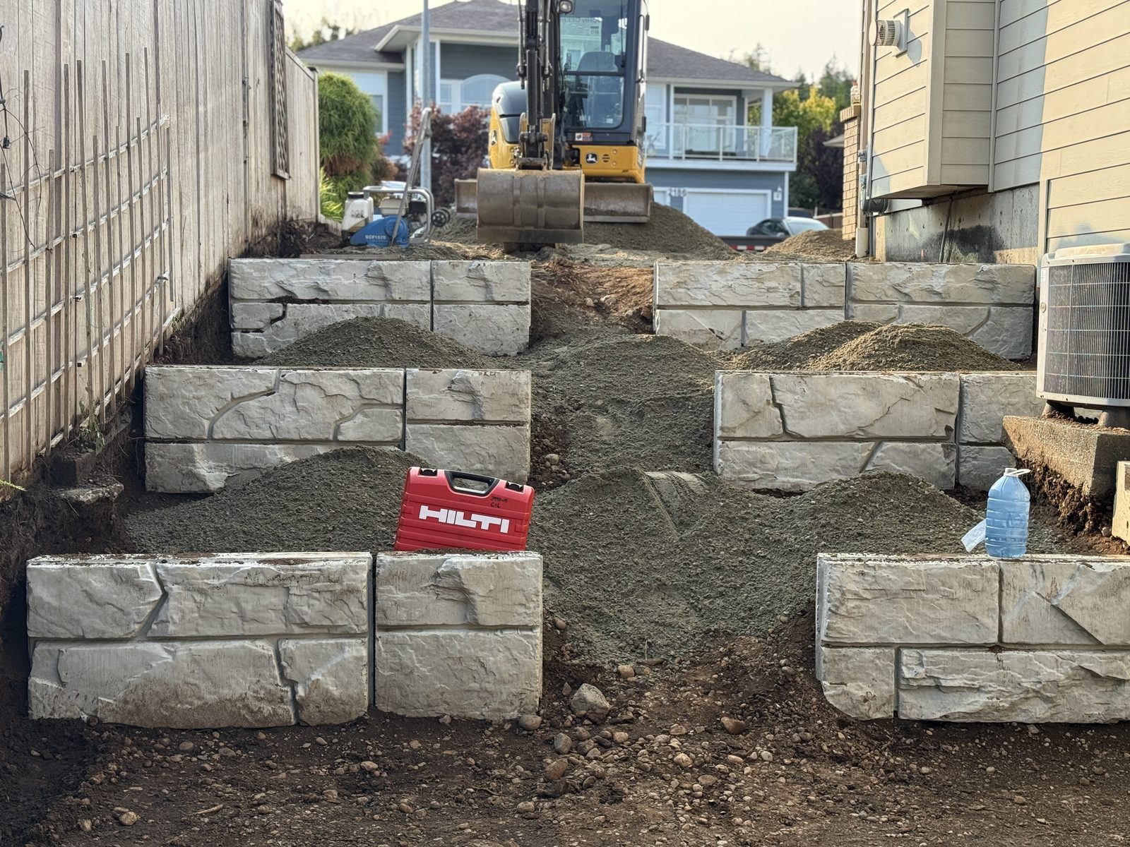 Multi-tier retaining wall block installation Vancouver Island
