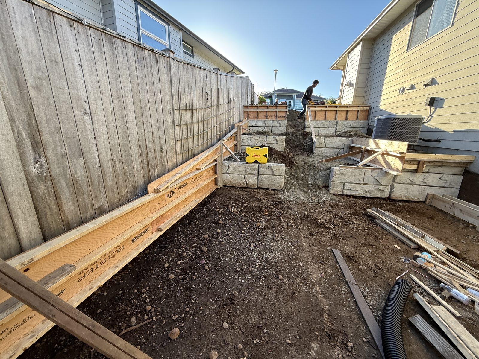 Tiered retaining wall progress Vancouver Island